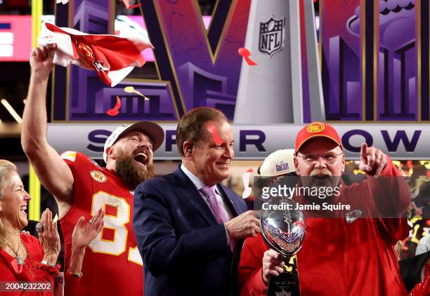 Travis Kelce and Head coach Andy Reid of the Kansas City Chiefs react after defeating the San Francisco 49ers 25-22 during Super Bowl LVIII at...