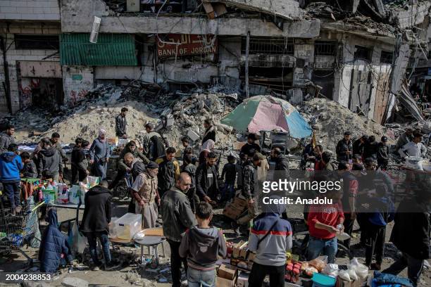 Hawkers are seen selling what little food and basic life necessities they have left on the streets as Palestinians struggle with the rising cost of...