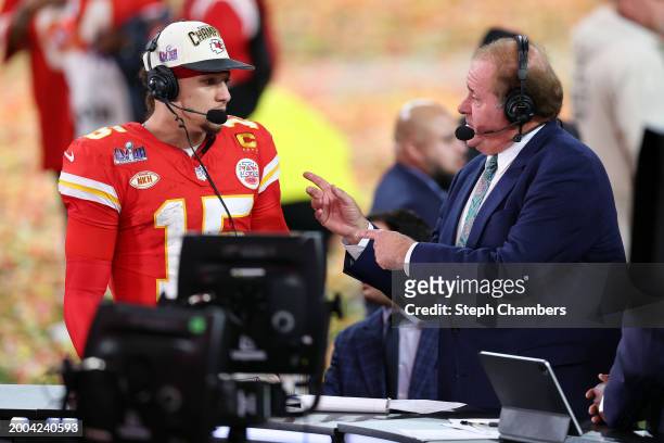 Commentator Chris Berman speaks with Patrick Mahomes of the Kansas City Chiefs after defeating the San Francisco 49ers 25-22 in overtime during Super...