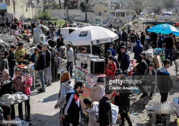 Hawkers are seen selling what little food and basic life necessities they have left on the streets as Palestinians struggle with the rising cost of...