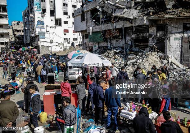 Hawkers are seen selling what little food and basic life necessities they have left on the streets as Palestinians struggle with the rising cost of...