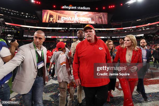 Head coach Andy Reid of the Kansas City Chiefs walks with wife Tammy Reid after defeating the San Francisco 49ers 25-22 during Super Bowl LVIII at...