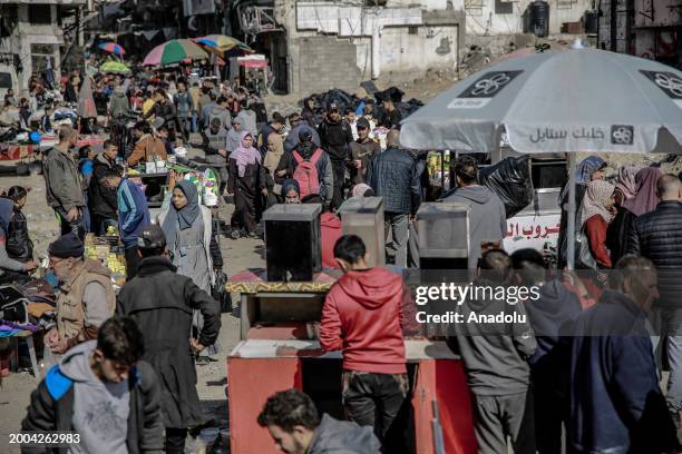 Hawkers are seen selling what little food and basic life necessities they have left on the streets as Palestinians struggle with the rising cost of...