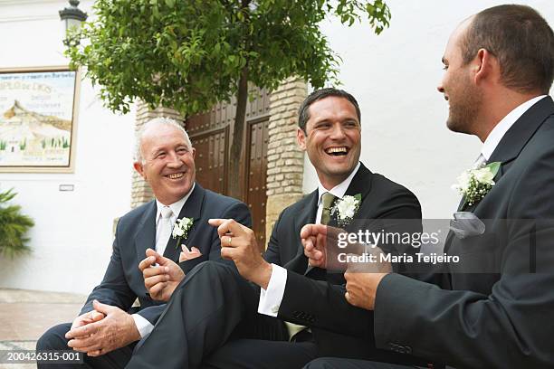 groom with father and best man outdoors, smiling - maria weding stock pictures, royalty-free photos & images