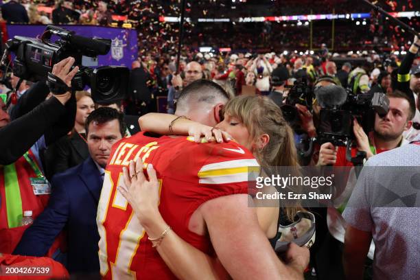 Travis Kelce of the Kansas City Chiefs hugs Taylor Swift after defeating the San Francisco 49ers 25-22 during Super Bowl LVIII at Allegiant Stadium...