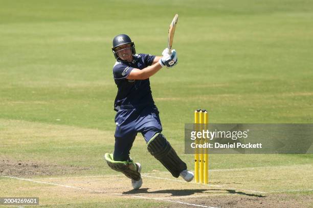 Georgia Prestwidge of Victoria hits a six during the WNCL match between Victoria and Tasmania at CitiPower Centre, on February 12 in Melbourne,...