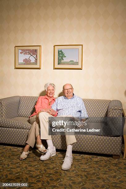 senior couple sitting on couch, portrait - couch close up stock pictures, royalty-free photos & images