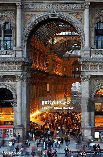 italy, milan, galleria vittorio emanuele entrance, elevated view, dusk - galleria vittorio emanuele ii stock pictures, royalty-free photos & images