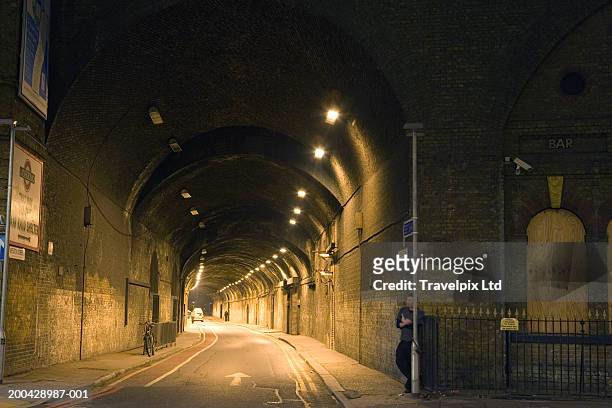 uk, london, illuminated underpass tunnel, night - underpass stock pictures, royalty-free photos & images
