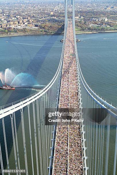 usa, new york, new york city marathon crossing verrazano  bridge - new york city marathon stock pictures, royalty-free photos & images