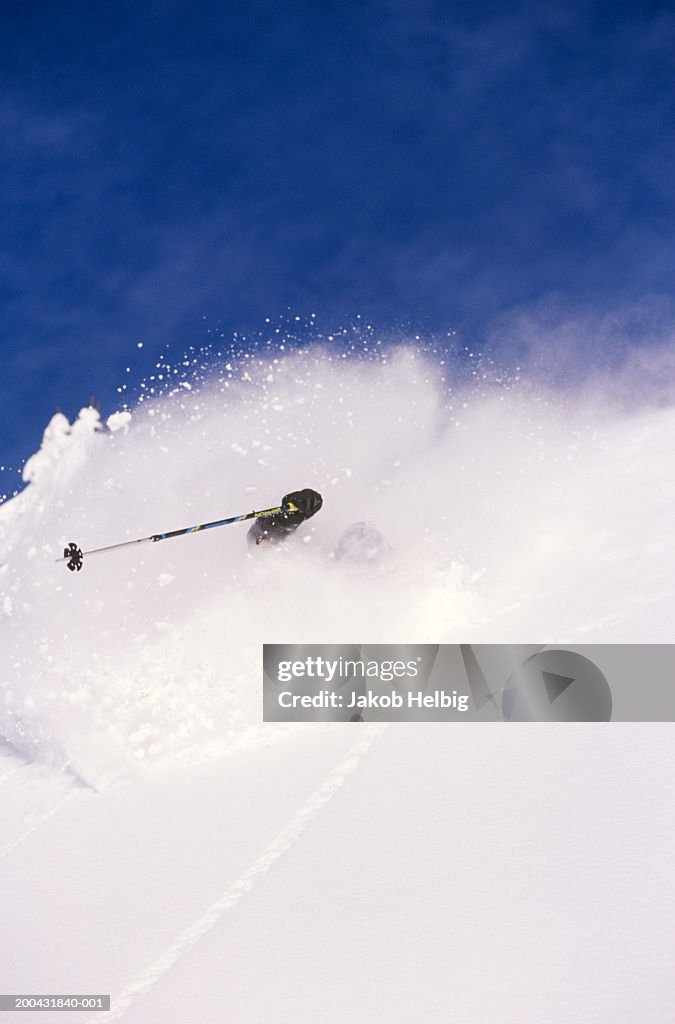 Man skiing in deep powder