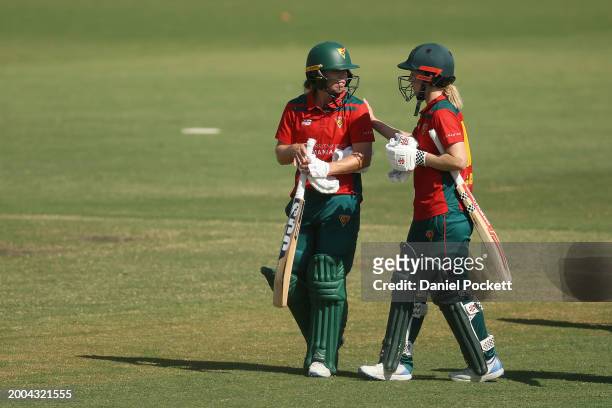 Nicola Carey of Tasmania and Naomi Stalenberg of Tasmania celebrate winning the WNCL match between Victoria and Tasmania at CitiPower Centre, on...