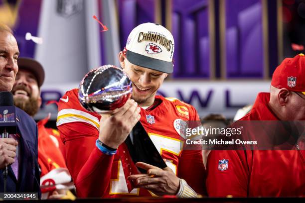 Patrick Mahomes of the Kansas City Chiefs celebrates with the Vince Lombardi Trophy following the NFL Super Bowl 58 football game between the San...