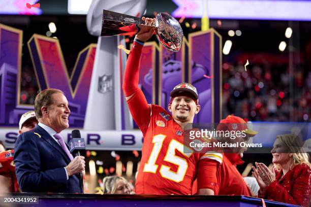 Patrick Mahomes of the Kansas City Chiefs celebrates with the Vince Lombardi Trophy following the NFL Super Bowl 58 football game between the San...