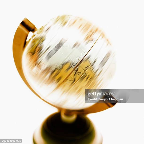 globe spinning fast (blurred motion) - fast motion stock pictures, royalty-free photos & images