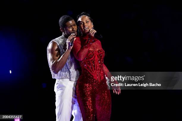 Usher performs with Alicia Keys during the Apple Music Super Bowl LVIII Halftime Show at Allegiant Stadium on February 11, 2024 in Las Vegas, Nevada.