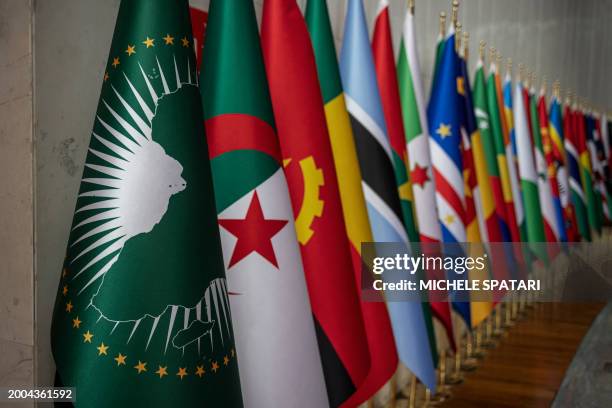 General view of the logo and the flags of the member states of the African Union at the AU headquarters in Addis Ababa on February 15, 2024.