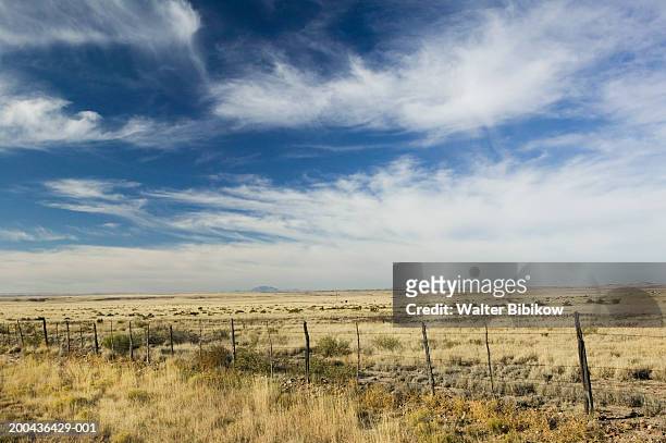 usa, texas, marfa, fence across ranch land - country western outside stockfoto's en -beelden