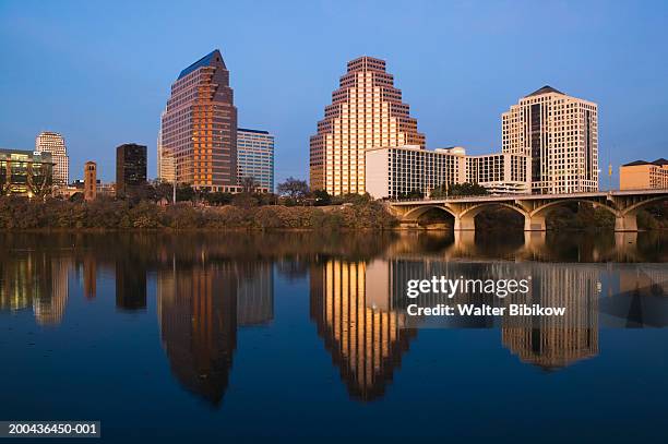 usa, texas, austin skyline along town lake, sunset - austin skyline stock pictures, royalty-free photos & images