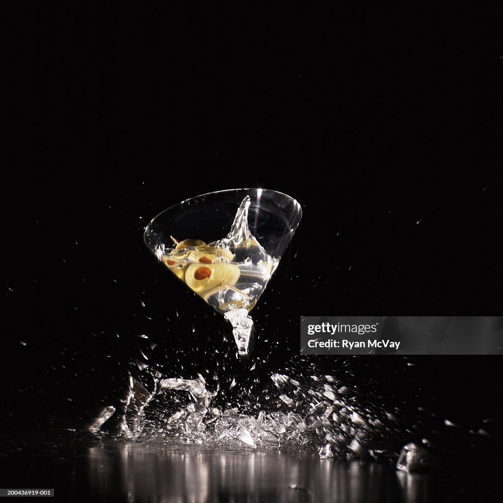 Martini glass shattering on floor (blurred motion)