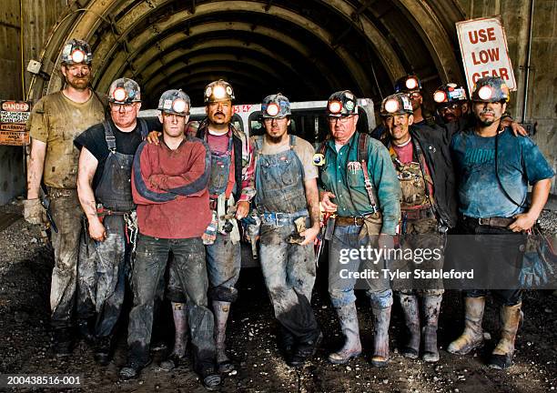 coal miners in front of mine shaft, portrait - minero de carbón fotografías e imágenes de stock