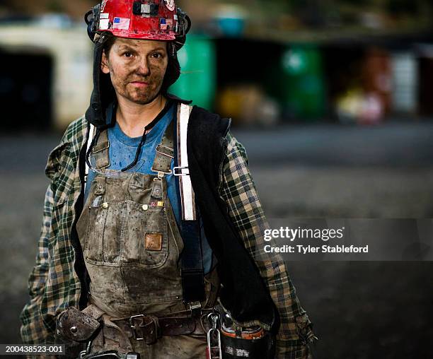 female coal miner outdoors, portrait, close-up - kohlenbergmann stock-fotos und bilder