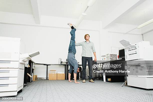 Office@hand Support Image 98 Handstand Office Stock Photos, High-Res Pictures, and Images - Getty ...