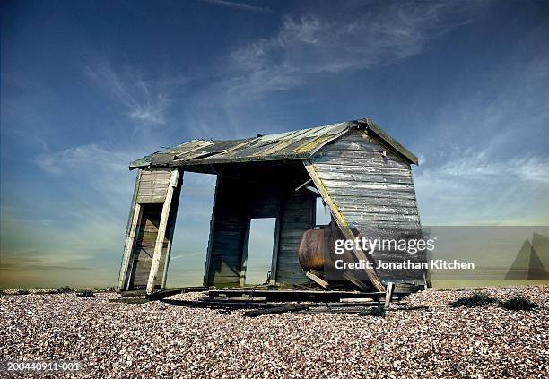 derelict hut on gravel beach - dungeness stock pictures, royalty-free photos & images