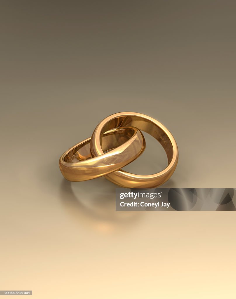 Pair of interlinked wedding rings