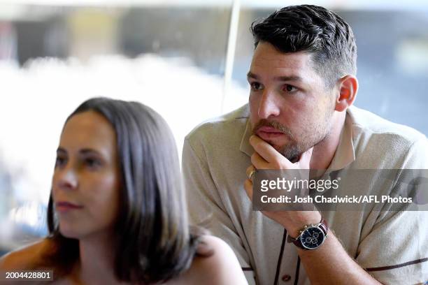 Hawthorn development coach and former NFL punter and AFL footballer, Arryn Siposs and wife Rachael Siposs watch onduring the Super Bowl Live Site/...