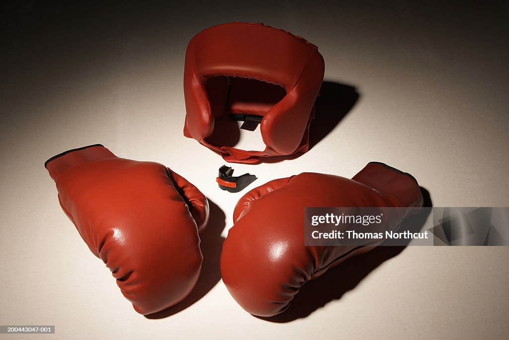 Boxing gloves and head protector, elevated view