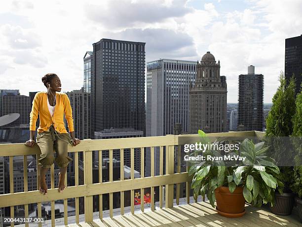 Sitting Railing Sitting On Railing Photos and Premium High Res Pictures - Getty Images