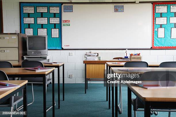 empty school classroom, exercise books and pens on table - whiteboard bildbanksfoton och bilder