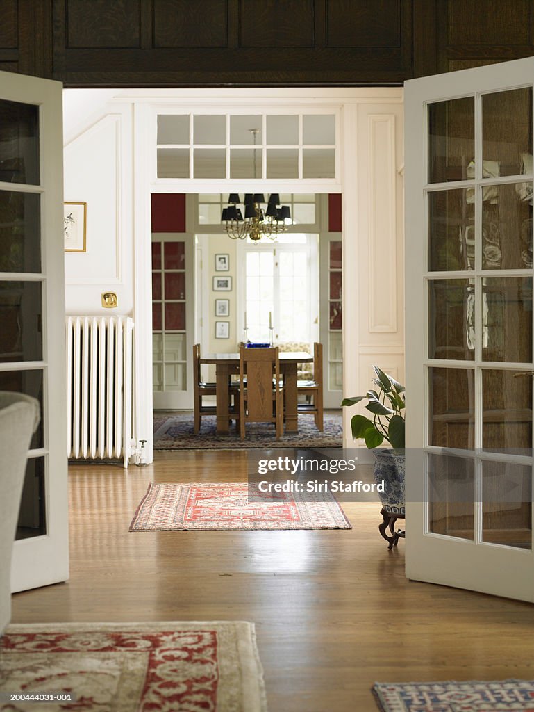 Interior Of Home From Living Room Through Entry Way And Dining Area ...