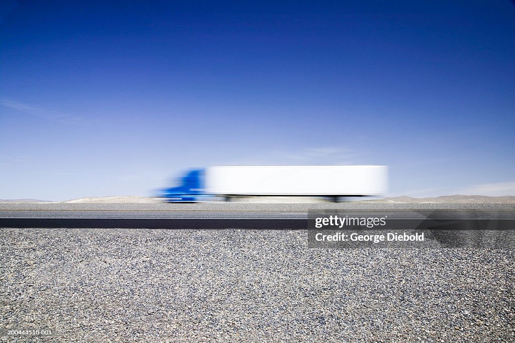 Truck on highway (blurred motion)