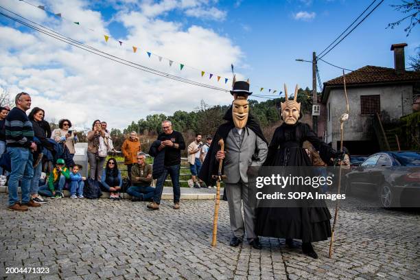 Caretos parade through the village of Lazarim on carnival day. People in Carnival costumes take part in Entrudo in Lazarim, a small town in the...