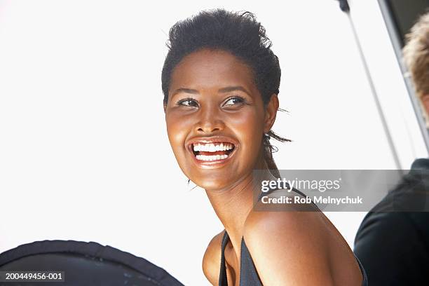 young female model on set during photo shoot, smiling - 40 year old models stock pictures, royalty-free photos & images