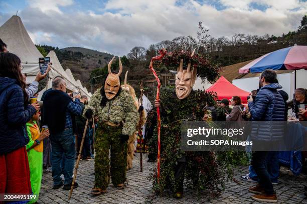 Caretos parade through the village of Lazarim on carnival day. People in Carnival costumes take part in Entrudo in Lazarim, a small town in the...