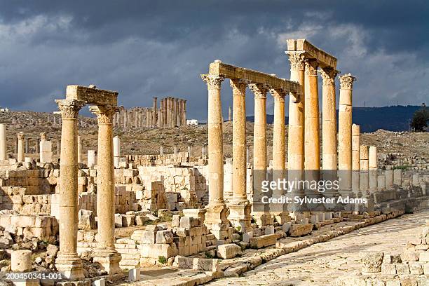 middle east, jordan, jerash, the cardo (main street) on a stormy day - jerash stock pictures, royalty-free photos & images