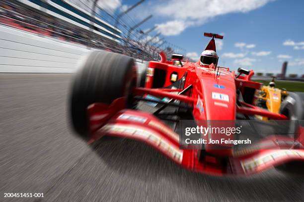 man driving open-wheel single-seater racing car race car (digital composite) - automobilismo foto e immagini stock