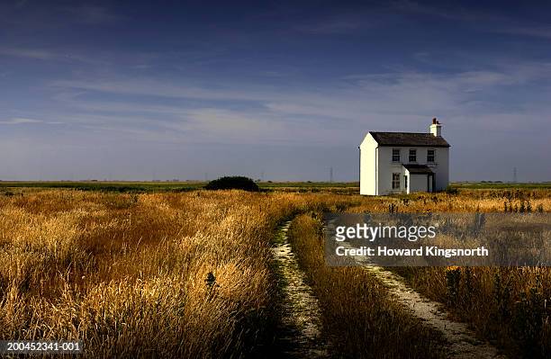 house in countryside - remote location stock-fotos und bilder