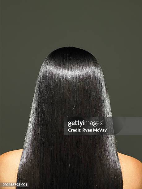 young woman with long hair, rear view - shiny straight hair stock pictures, royalty-free photos & images