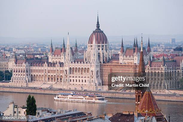 hungary, budapest, parliament building by river danube - danube river foto e immagini stock