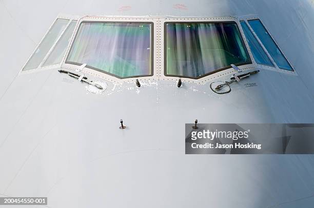 front section of 747 passenger plane - aviation stock-fotos und bilder
