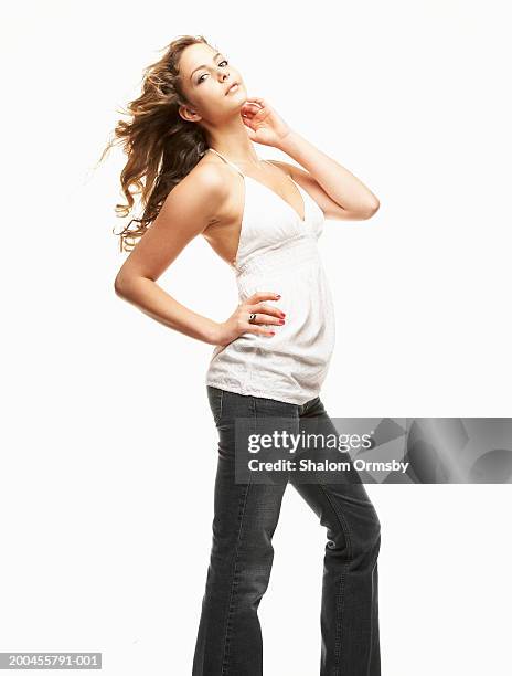 Woman standing with hand on hip, portrait - Stock Photo - Masterfile -  Premium Royalty-Free, Code: 632-05816208