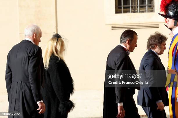 Argentina's President Javier Milei and his sister Karina Elizabeth Milei arrive at the Apostolic Palace for an audience with Pope Francis on February...