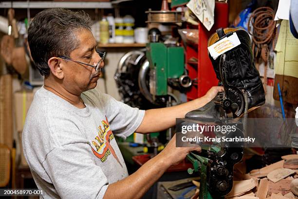 Cowboy Boot Machine 20 Cowboy Boot Maker Stock Photos, High-Res Pictures, and Images ...