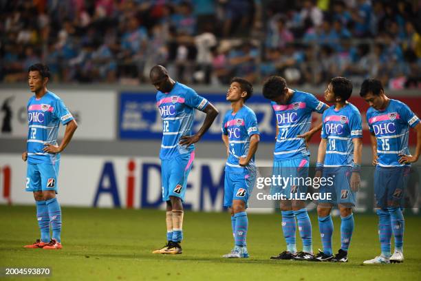 Sagan Tosu players look dejected after the team's 1-3 defeat in the J.League J1 match between Sagan Tosu and Gamba Osaka at Best Amenity Stadium on...