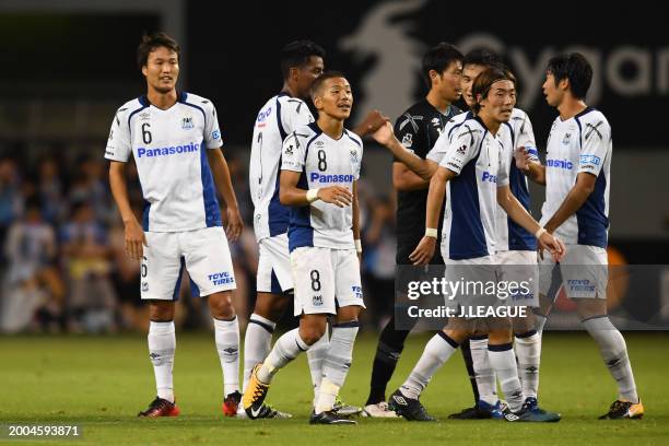 Gamba Osaka players celebrate the team's 3-1 victory in the J.League J1 match between Sagan Tosu and Gamba Osaka at Best Amenity Stadium on August...
