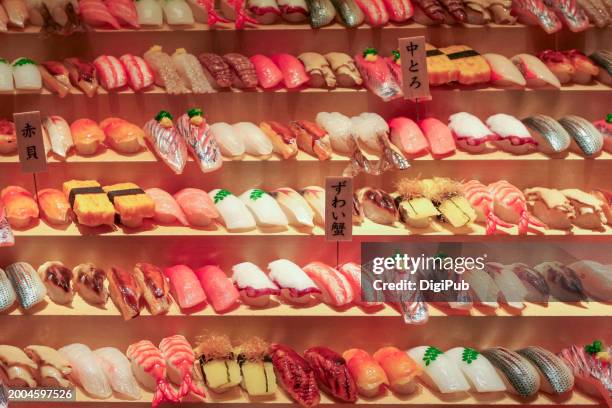 assortment of sushi display models - dashimaki tamago fotografías e imágenes de stock